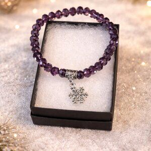NWOT Purple Faceted Bead Stretch Bracelet w/ Snowflake Charm